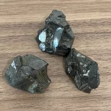 3 pieces of elite Shungite on table