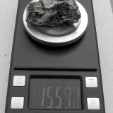 Piece of Elite Shungite 15 grams on a scale