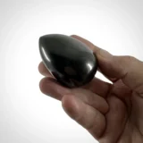 Hand Holding 60mm Shungite Egg